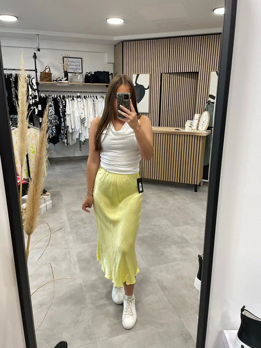 Rock in Seidenoptik Pastellgelb